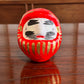 Daruma porte bonheur en papier mâché