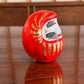 Daruma porte bonheur en papier mâché