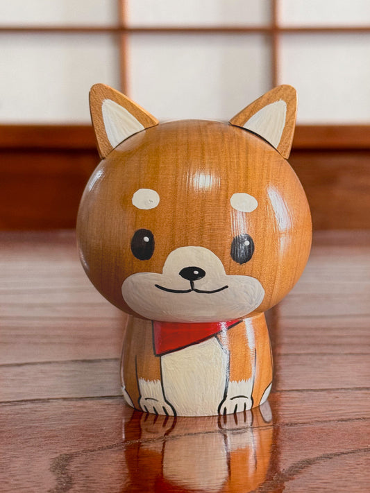 Kokeshi creative chien brun foulard rouge