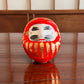 Daruma porte bonheur en papier mâché