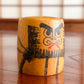 Kokeshi daruma petite noir et rouge profil