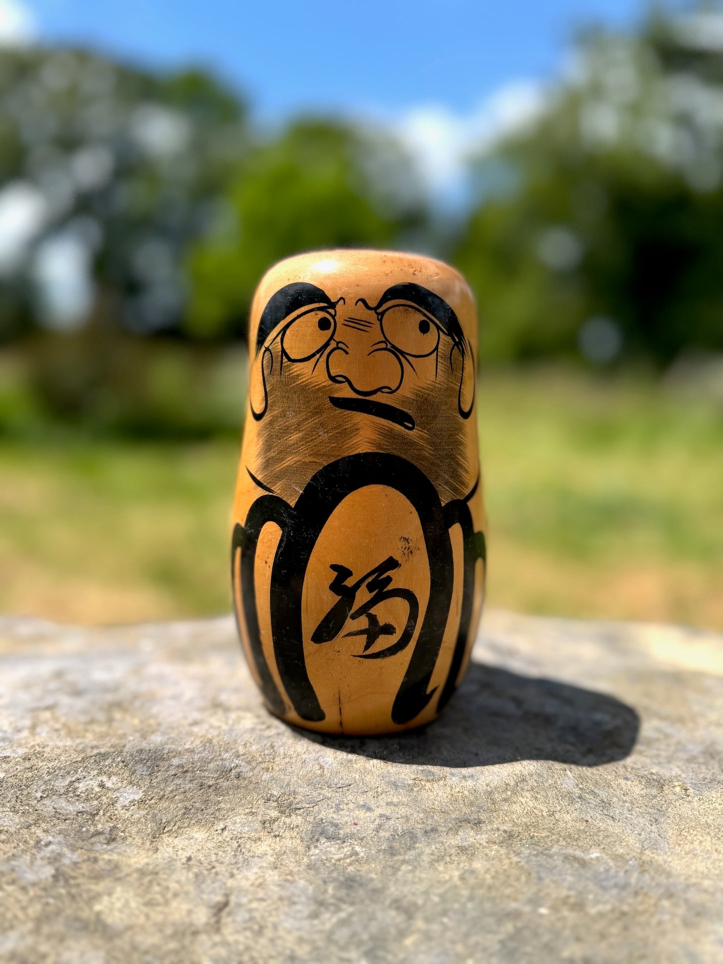 Daruma bois naturel vernis peint noir