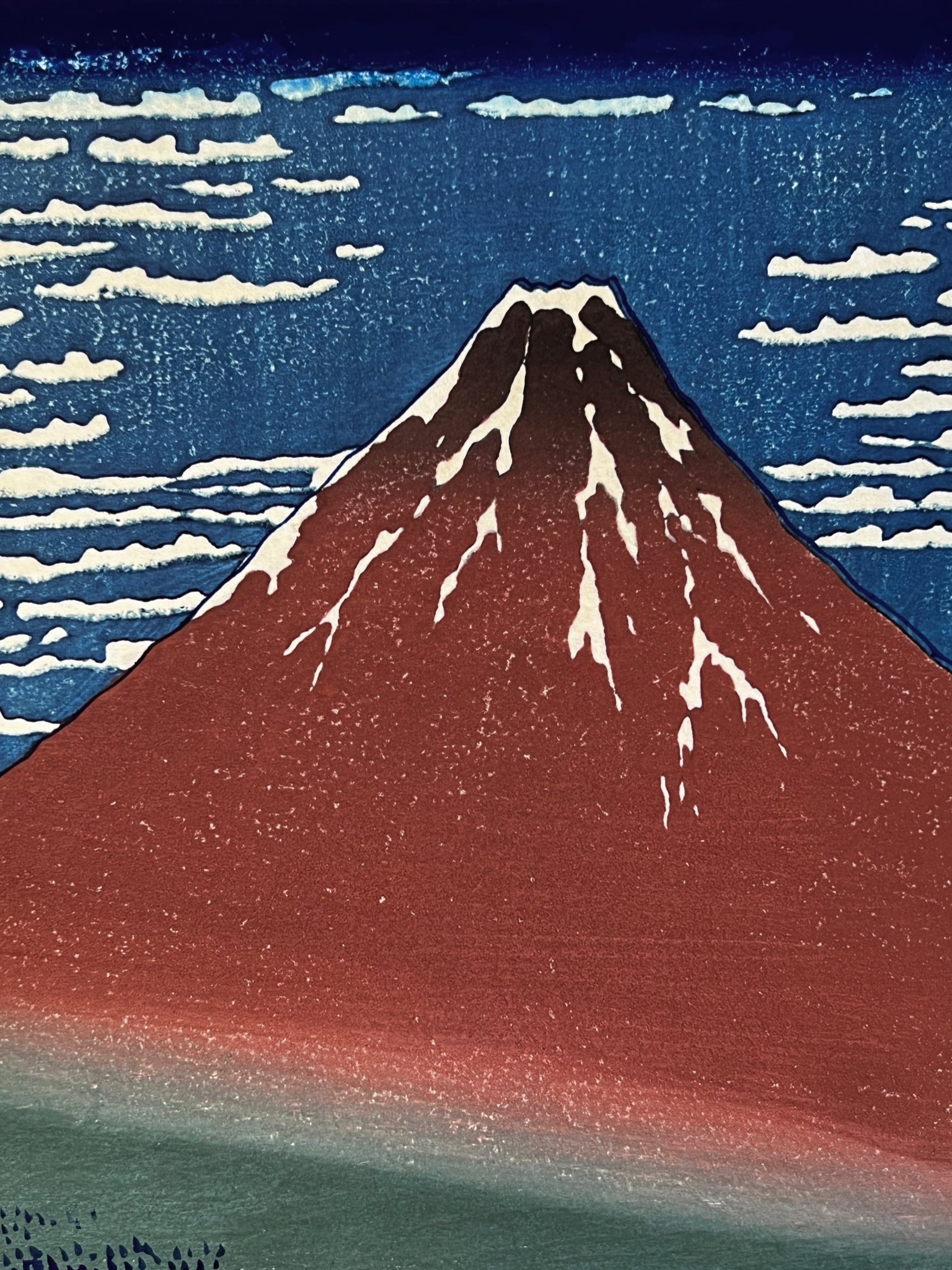 estampe japonaise de Hokusaï, le Mont Fuji rouge, gros plan sur le sommet