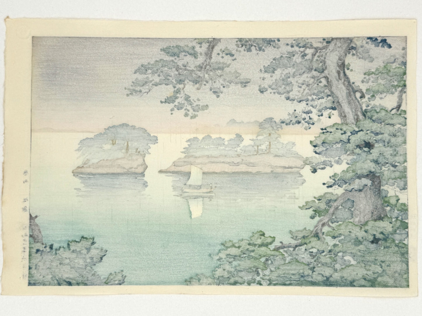 estampe japonaise paysage de Koitsu, les îles aux pins de Matsushima sous la pluie, dos de l'estampe